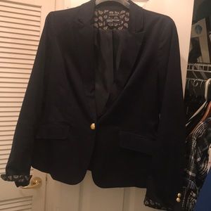 Navy blazer with gold buttons and paisley lining